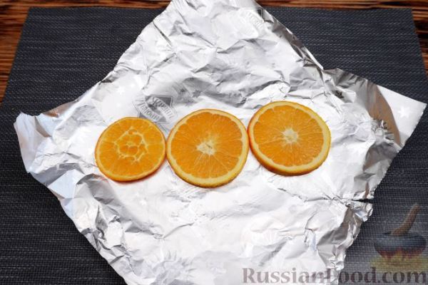 Рыба, запечённая с лимоном и апельсином