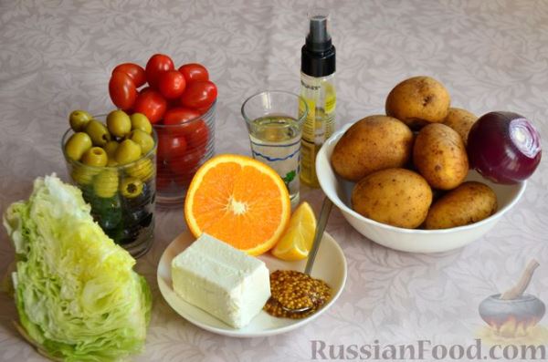 Салат с жареным картофелем, помидорами, оливками и фетой